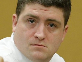 Cleveland police officer Michael Brelo attends his manslaughter trial in Cleveland, Ohio, in this file photo taken April 6, 2015. Brelo was found not guilty on Saturday of voluntary manslaughter of an unarmed man and woman who were killed after a high-speed car chase in 2012. REUTERS/Tony Dejak/Pool/Files