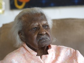 Jeralean Talley, 116, sits in the living-room of her home in Inkster, Michigan April 18, 2015. REUTERS/Rebecca Cook