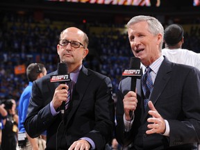 Jeff Van Gundy (left), seen here with fellow announcer Mike Breen, is reportedly interested in the coaching vacancy with the Pelicans. (Garrett Ellwood/NBAE via Getty Images/AFP/Files)