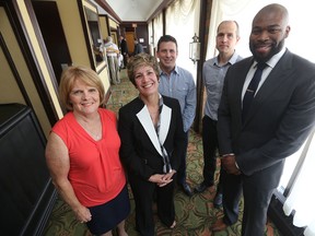 Manitoba High School Hall of Fame inductees (left to right) Linda Puttaert, Jill Mathez, Byron Goodwin, Scott Koskie, Israel Idonije prior to the induction ceremony on Saturday, May 23, 2015. Chris Procaylo/Winnipeg Sun/ Postmedia Network