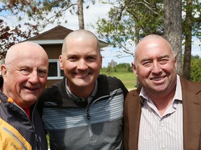 Ron Smith, left, Paul Schweyer and John Scott had their heads shaved for the Shave for Cancer fundraiser at the Idylwylde Golf and Country Club in Sudbury, Ont. on Friday May 22, 2015. The event was the creation of Idylwylde Golf and Country Club pro Paul Schweyer, who wanted to raise money and awareness for cancer research for the Northeast Cancer Centre. A total of $17,000 was raised. The Idylwylde and the Northern Cancer Foundation  will continue to take donations until the end of May in an effort to reach the Shave for Cancer goal of $20,000. For more information, call 705-523-4673. John Lappa/Sudbury Star/Postmedia Network