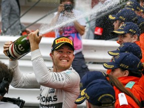 Mercedes Formula One driver Nico Rosberg of Germany sprays champagne after winning the Monaco F1 Grand Prix in Monaco May 24, 2015. REUTERS/Robert Pratta