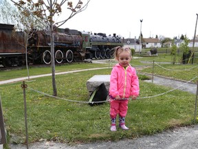 Kaleigh McCormick, 2, watches Thomas the Tank Engine ride the rails at the season opening of the Northern Ontario Railroad Museum and Heritage Centre in Capreol, Ont. on Saturday May 23, 2015. The museum hours are 10 a.m. to 4 p.m. Monday to Sunday until Sept. 4. Thomas the Tank Engine is showcased only on special occasions at the museum. John Lappa/Sudbury Star/Postmedia Network