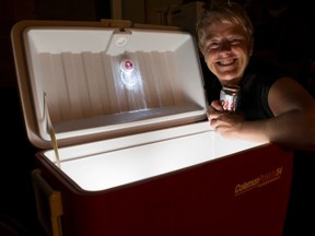 Linda Pond poses with her invention, the F.A.B. light, at her home in Carleton Place on Friday May 22, 2015. 
Errol McGihon/Ottawa Sun/Postmedia Network