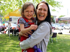 Kristen Edwards, 37, with her daughter Paige Hollett, 4, at the 2015 Mandarin Multiple Sclerosis Walk in Kingston, Ont. on Sunday May 24, 2015. Edwards was diagnosed with MS at 31 and is just taking it one day at a time. Steph Crosier/Kingston Whig-Standard/Postmedia Network