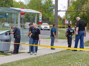 Toronto Police at the scene behind 25 San Romanoway after a boy was shot in the leg Sunday, May 24, 2015. (Dave Thomas/Toronto Sun)