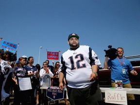 Pablo Munoz, organizer of the "Free Tom Brady" rally looks on at Gillette Stadium on May 24, 2015 in Foxboro, Massachusetts. The rally was held in protest of Brady's four game suspension for his role in the "deflategate" scandal. (Maddie Meyer/Getty Images/AFP)