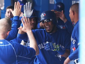 Blue Jays’ Edwin Encarnacion celebrates his two-run home run on Sunday against the Mariners at the Rogers Centre. (AFP/PHOTO)