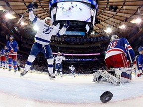 Steven Stamkos #91 of the Tampa Bay Lightning celebrates after scoring a goal against Henrik Lundqvist #30 of the New York Rangers during the second period in Game Five of the Eastern Conference Finals during the 2015 NHL Stanley Cup Playoffs at Madison Square Garden on May 24, 2015 in New York City.  (Bruce Bennett/Getty Images/AFP)