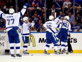 Steven Stamkos #91 of the Tampa Bay Lightning celebrates his second period goal with teammates against the New York Rangers in Game Five of the Eastern Conference Finals during the 2015 NHL Stanley Cup Playoffs at Madison Square Garden on May 24, 2015 in New York City.  (Bruce Bennett/Getty Images/AFP)