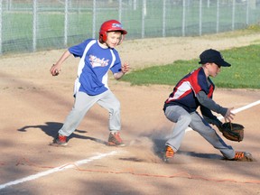 Mitchell's Keegan Priestap rounds third base against Exeter during recent Major Rookie baseball action. ANDY BADER/MITCHELL ADVOCATE