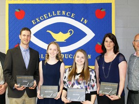 Claiming Excellence in Education awards recently from Mitchell District High School (MDHS) were A.J. Moses (second from left), Mikayla McMann, Alyssa Bublitz and Diana MacLeod. On hand from MDHS for the presentations were Adam Agar (left) and Shawn Allen (right). SUBMITTED
