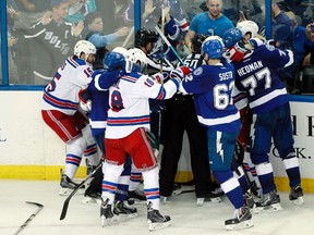 Members of the New York Rangers and Tampa Bay Lightning engage in a scrum after a whistle in Game 4 of the Eastern Conference final at Amalie Arena on May 22, 2015. (Kim Klement/USA TODAY Sports)