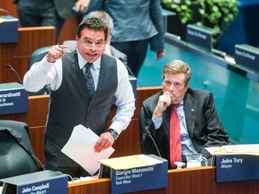 Councillor Giorgio Mammoliti (left) and Mayor John Tory during the afternoon session of city council at City Hall in Toronto May 5, 2015. (Ernest Doroszuk/Toronto Sun)