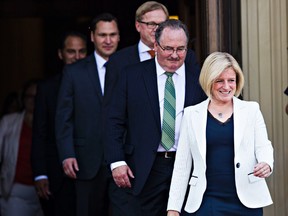The cabinet, led by Premier Rachel Notley, arrives during the swearing-in ceremony for the NDP government cabinet at the Alberta Legislature Building in Edmonton, Alta. on Sunday, May 24, 2015. Codie McLachlan/Edmonton Sun