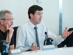Mayor Don Iveson and Councillor Bryan Anderson (left) take part in an Edmonton City Council community services committee meeting Monday. David Bloom/Edmonton Sun/Postmedia Network