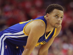 Golden State Warriors guard Stephen Curry (30) reacts during the second half against the Houston Rockets in game four of the Western Conference Finals of the NBA Playoffs. (Thomas B. Shea-USA TODAY Sports)