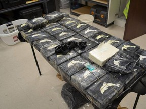 Police are investigating after a sixth package of drugs washed up on the same Texas beach this week; including 66 pounds of cocaine tightly wrapped in plastic with a dolphin stamp on it. (Postmedia Network/Galveston Police Department)