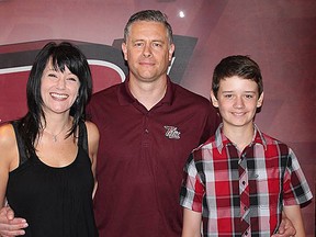 Jake Grimes with wife Kim and son Dixon after being introduced as the newest assistant coach of the Peterborough Petes Tuesday in Peterborough. (Peterborough Petes photo)