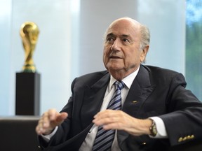 President of International governing body of association football FIFA Sepp Blatter during an interview on May 15, 2015. (AFP PHOTO/FABRICE COFFRINI)