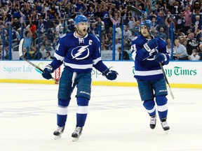 Lightning centre Steven Stamkos (left) celebrates after scoring a goal against the Rangers during second period action in Game 4 of the Eastern Conference final in Tampa, Fla. on May 22, 2015. (Kim Klement/USA TODAY Sports)