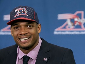 Newly signed defensive end Michael Sam smiles as he is introduced to the media by the Montreal Alouettes CFL football team in Montreal, May 26, 2015. (REUTERS/Christinne Muschi)