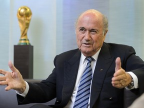 FIFA president Sepp Blatter gestures during an interview on May 15, 2015 at the organization’s headquarters in Zurich. (AFP PHOTO/FABRICE COFFRINI)