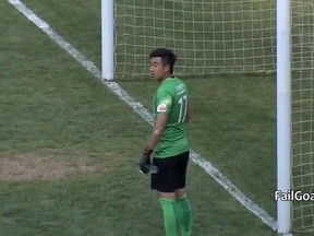 Chongqing Lifan goalkeeper Sui Weijie was caught out of his net taking a water break when Liaoning midfielder Ding Haifeng darted past a group of static defenders and scored into an empty net during a Chinese Super League match on Sunday, May 24, 2015.