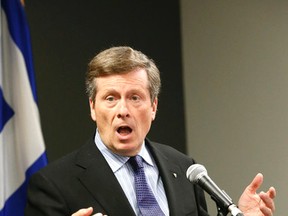 Toronto Mayor John Tory speaks to media outside his office at City Hall. (Michael Peake/Toronto Sun)
