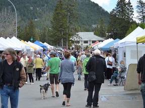 It was a busy day in the market on Wednesday, June 11, 2014 for the first Banff Farmers Market of the summer. This year, the market has moved to Bear Street beginning Wednesday, June 10. (Michelle Ferguson/ Crag & Canyon/ Postmedia Network)