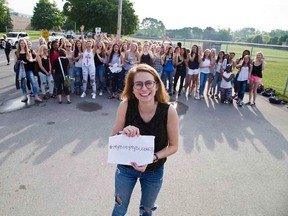 More than 100 Lucas secondary school students defied their school dress code as part of a protest organized by Laura Anderson, who was sent home by a vice-principal for `inappropriate? dress Monday. (DEREK RUTTAN, The London Free Press)