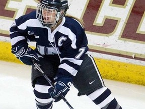 Kelly Paton, seen here playing for the University of New Hampshire Wildcats women's hockey team, was named as a full-time associate coach for Western University's women's hockey team. She served as the team's player development coach last year when Western won the Canadian InterUniversity women's hockey championship and was also the strength and conditioning coach for the Canadian women's hockey under-18 national team. (Photo courtesy of University of New Hampshire athletic department)