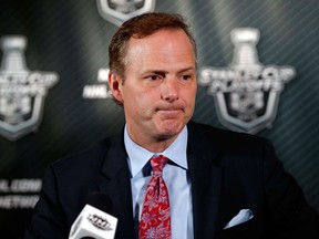Jon Cooper of the Tampa Bay Lightning speaks to the media after being defeated by the New York Rangers in Game Six of the Eastern Conference Finals during the 2015 NHL Stanley Cup Playoffs at Amalie Arena on May 26, 2015 in Tampa, Florida. (Mike Carlson/Getty Images/AFP)