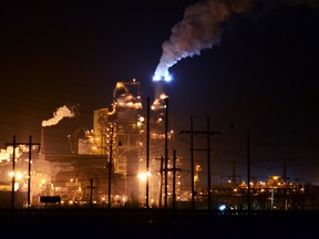 Syncrude oilsands seen at night north of Fort McMurray MICHELLE ALLENBERG/TODAY STAFF/Postmedia Network