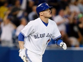 Toronto Blue Jays third baseman Josh Donaldson watches his three-run home run clear the wall against the Chicago White Sox in the ninth inning at Rogers Centre on May 26, 2015. Toronto defeated Chicago 10-9. (JOHN E. SOKOLOWSKI/USA TODAY Sports)