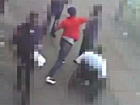 D.C. police released surveillance camera video in an attempt to find a man who punched out and robbed an elderly man of $1 on May 17, 2015. (YouTube)