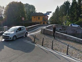 Bridge near Milan where a teen jumped into a shallow canal and spent 42 minutes underwater on April 24, 2015. (Google Maps)