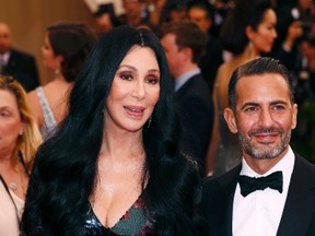 Cher and designer Marc Jacobs arrive at the Metropolitan Museum of Art Costume Institute Gala 2015 celebrating the opening of "China: Through the Looking Glass," in Manhattan, New York May 4, 2015.  REUTERS/Lucas Jackson