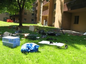 Items thrown from a the top balcony of a Kipps Lane apartment building. The building was evacuated as police repsonded.  (Jennifer O'Brien, The London Free Press)