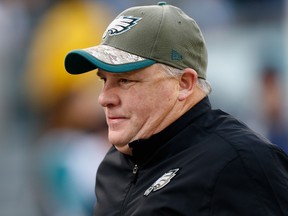 Head coach Chip Kelly of the Philadelphia Eagles jogs off the field at halftime during the game against the Tennessee Titans at Lincoln Financial Field on November 23, 2014 in Philadelphia, Pennsylvania.   (Jeff Zelevansky/Getty Images/AFP)