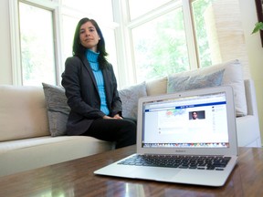 Western University Faculty of Information and Media Studies associate professor Anabel Quan-Hasse has completed a study that found 88% of Facebook users 'creep their ex-partners, which may lead to behavioural changes.  Quan-Hasse is pictured here in her home in London, Ont. on Thursday May 28, 2015. (Craig Glover/The London Free Press)