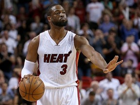 Dwyane Wade of the Miami Heat slows down the offense during a game against the Cleveland Cavaliers at American Airlines Arena on March 16, 2015 in Miami. (Mike Ehrmann/Getty Images/AFP)
