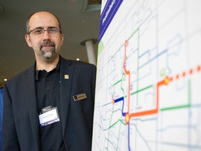 City of London director of roads and transportation Edward Soldo stands next to a map showing preferred rapid transit corridors at a public information session about Shift, a transportation initiative focused on rapid transit, at the Western Fair District Agriplex in London, Ont. on Thursday May 28, 2015. The drop-in session gives the public a look at the preliminary plans and give feedback.  Another session is taking place at Goodwill on Horton Street on Saturday at 10 am. (Craig Glover/The London Free Press/Postmedia Network)