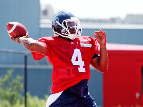 Quarterback Blake Sims gets into a brief throwing session on Thursday during the Argos’ training camp at York University. (VERONICA HENRI/TORONTO SUN)