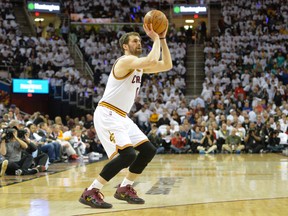 Cleveland Cavaliers forward Kevin Love (0) shoots in the first quarter against the Boston Celtics in game two of the first round of the NBA Playoffs at Quicken Loans Arena. Mandatory Credit: David Richard-USA TODAY Sports
