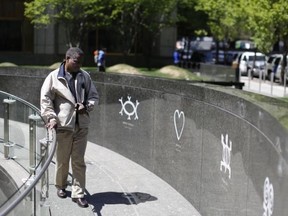 A man walks through the African Burial Ground National Monument in New York in this May 3, 2013 file photo.
Reuters/Brendan McDermid/Files