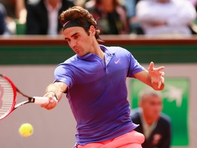 Switzerland's Roger Federer won his third round match against Damir Dzumhur of Bosnia at the French Open in Paris on Friday, May 29, 2015. (Jason Cairnduff/Reuters)