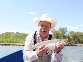 Neil Waugh with a western ruffian Bow River rainbow.