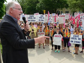 Striking municipal inside workers rally outside London city hall Friday, where they were addressed by Paul Moist, national CUPE president. (MORRIS LAMONT, The London Free Press)
