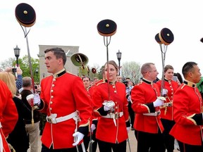 Graduating Royal Military College cadets march through the Memorial Arch after graduating in a commissioning parade in Kingston on Friday  May 15 2015. Ian MacAlpine /The Kingston Whig-Standard/Postmedia Network